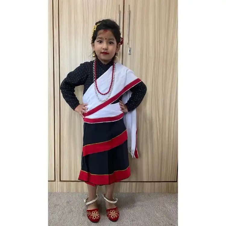 Girl Newari Traditional Saree Set Bhoto And Readymade Saree Patuki With Red Boarder Muga Red Mala Silver Plated Jyapu Shikhaa Sachika For Hair Bond Gold Plated Ear Ring Makasi Gold Plated Nyapu Shikhaa Silver Plated Kale