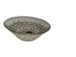 The set contains one large serving bowl and six matching smaller individual bowls, featuring a distinct textured, honeycomb-like pattern.