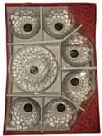 The set contains one large serving bowl and six matching smaller individual bowls, featuring a distinct textured, honeycomb-like pattern.